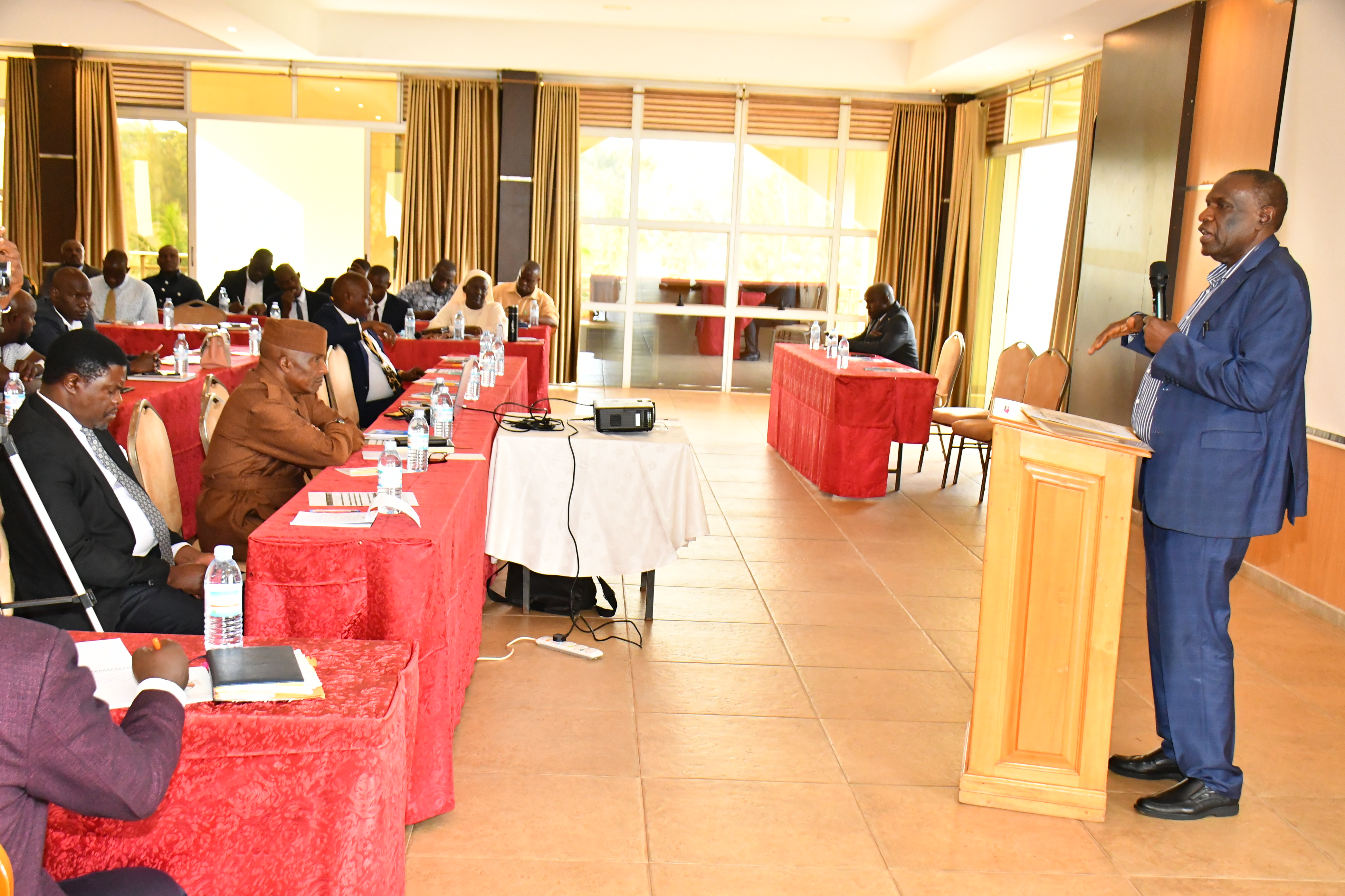 Haji Kakande Yunus making a speech to the RDCs at the workshop